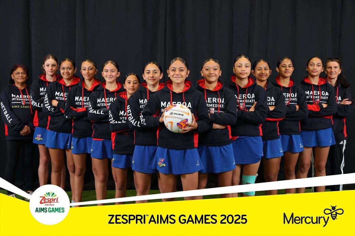Maeroa Intermediate netball team posing together at the Zespri AIMS Games 2025.
